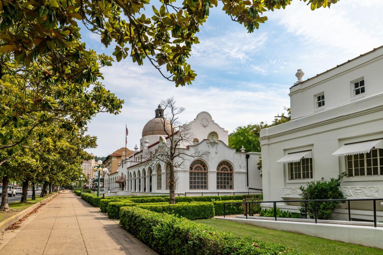 row of traditional bathhouses in hot springs