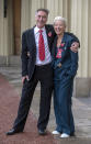 With husband Greg Wise outside Buckingham Palace (Steve Parsons/PA)