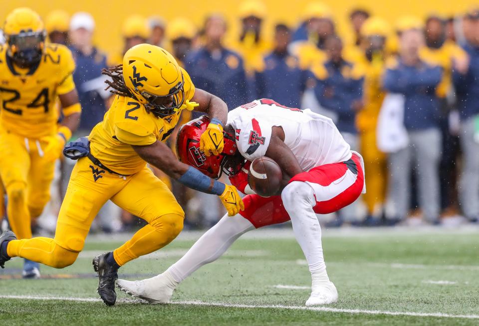 West Virginia's safety Aubrey Burks (2) breaks up a pass intended for Texas Tech's wide receiver Loic Fouonji (11), Saturday, Sept. 23, 2023, at Milan Puskar Stadium, in Morgantown, West Virginia.