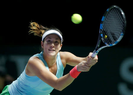 Singapore WTA Finals Round Robin Singles - Singapore Indoor Stadium, Singapore - 28/10/2016 - Garbine Muguruza of Spain in action against Svetlana Kuznetsova of Russia REUTERS/Edgar Su