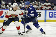 Tampa Bay Lightning defenseman Victor Hedman (77) puts a move on Florida Panthers defenseman Gustav Forsling (42) during the second period in Game 6 of an NHL hockey Stanley Cup first-round playoff series Wednesday, May 26, 2021, in Tampa, Fla. (AP Photo/Chris O'Meara)