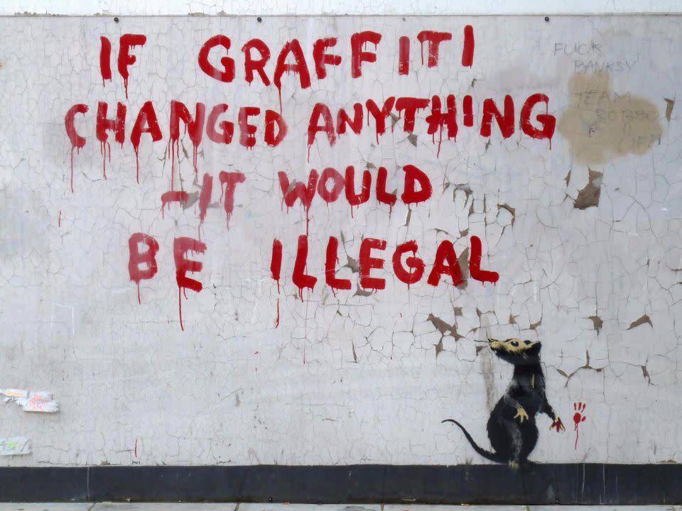 The identity of well-known graffiti artist Banksy has been kept hidden for over 20 years. Source: Getty