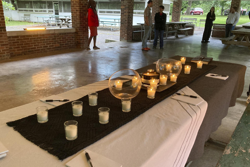 Memorial candles are prepared for a memorial service on Sunday, June 11, 2023 for Dr. John Forsyth in Monett, Mo. Forsyth, a Missouri doctor, body was found in a northwest Arkansas lake after he had been missing for nine days. (AP Photo/Margaret Stafford)