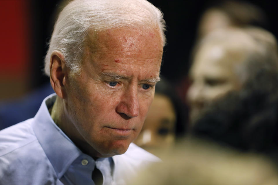 Democratic presidential candidate former Vice President Joe Biden talks with audience members during a town hall meeting, Thursday, Oct. 31, 2019, in Fort Dodge, Iowa. (AP Photo/Charlie Neibergall)