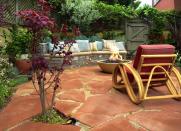 <body> <p>A small yard will feel more grand if you turn it into a destination. Create an outdoor room with a nicely arranged patio set and grill. Or add a special feature like a <a rel="nofollow noopener" href=" https://www.bobvila.com/slideshow/10-inventive-designs-for-a-diy-garden-fountain-49001?bv=yahoo" target="_blank" data-ylk="slk:fountain;elm:context_link;itc:0;sec:content-canvas" class="link ">fountain</a>, fire pit, or cozy reading nook to make this tiny spot worth the visit.</p> <p><strong>Related: <a rel="nofollow noopener" href=" http://www.bobvila.com/slideshow/no-money-to-burn-9-fire-pits-you-can-afford-48685?bv=yahoo" target="_blank" data-ylk="slk:No Money to Burn? 9 Fire Pits You Can Afford;elm:context_link;itc:0;sec:content-canvas" class="link ">No Money to Burn? 9 Fire Pits You Can Afford</a> </strong> </p> </body>