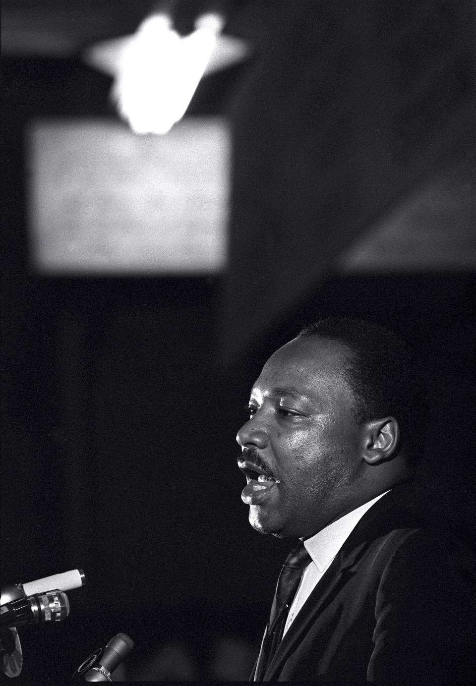 In this April 3, 1968, file photo, Dr. Martin Luther King Jr. makes his last public appearance at the Mason Temple in Memphis, Tennessee. The following day King was assassinated on his motel balcony.