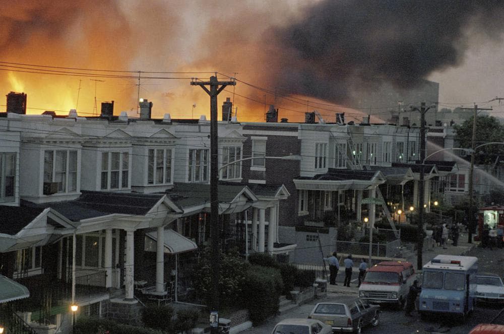 In this May, 1985 file photo, scores of row houses burn in a fire in the west Philadelphia neighborhood. (AP Photo/File)