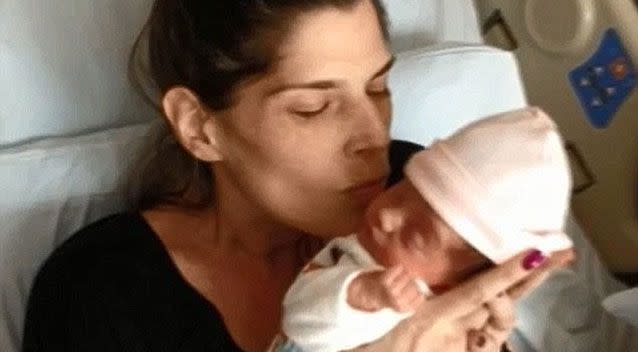 Liz and her daughter Lily just after she was born. Photo: Youtube