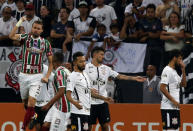 Soccer Football - Brazilian Championship - Corinthians v Fluminense - Arena Corinthians Stadium, Sao Paulo, Brazil - November 15, 2017. Henrique (L) of Fluminense reacts after scoring a goal. REUTERS/Paulo Whitaker