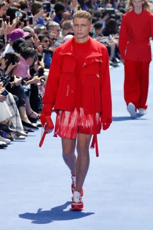 A model presents a creation by designer Virgil Abloh as part of his Spring/Summer 2019 collection for Louis Vuitton fashion house during Men's Fashion Week in Paris, France, June 21, 2018. REUTERS/Charles Platiau