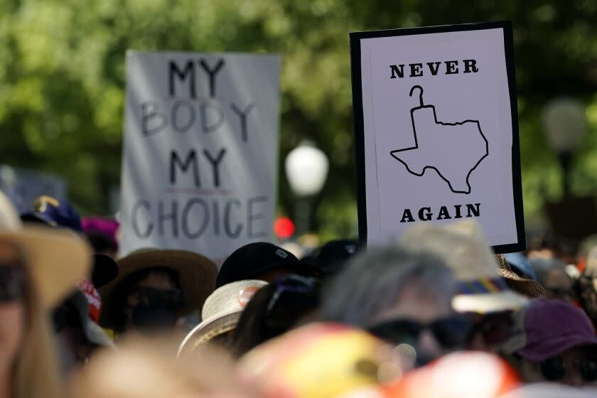 Abortion rights demonstrators holds signs during a rally at the Texas Capitol, Saturday, May 14, 2022, in Austin, Texas. Demonstrators are rallying from coast to coast in the face of an anticipated Supreme Court decision that could overturn women's right to an abortion. More (AP Photo/Eric Gay)