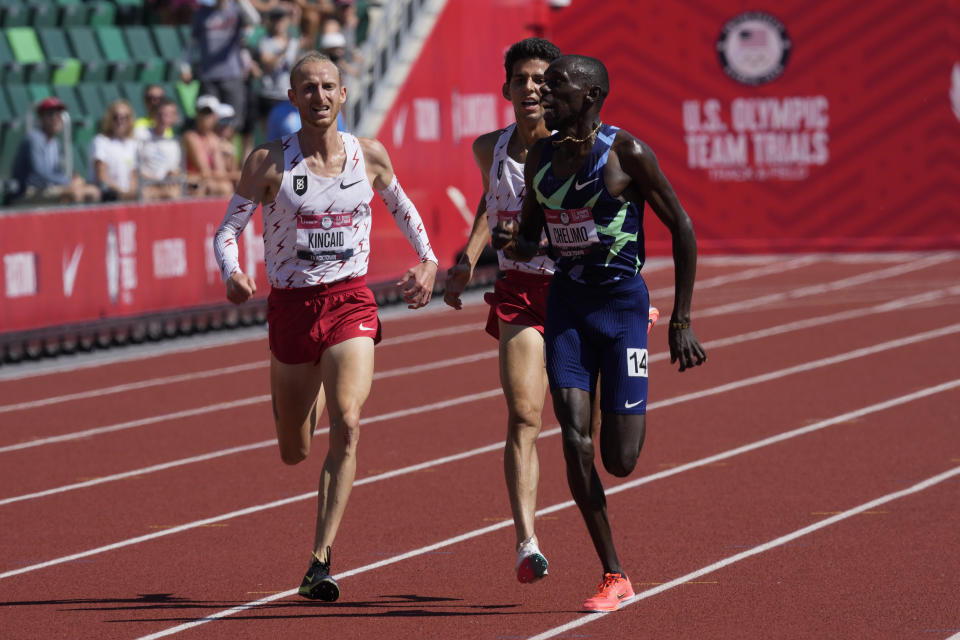 Paul Chelimo celebrates after beating Grant Fisher and Woody Kincaid in the finals of men's 5000-meter run at the U.S. Olympic Track and Field Trials Sunday, June 27, 2021, in Eugene, Ore. (AP Photo/Ashley Landis)