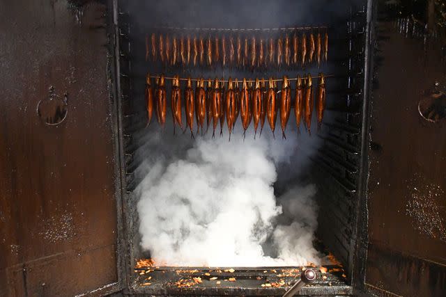 <p>Courtesy of Svaneke Røgeri</p> Fish being smoked at Svaneke Røgeri in Gotland, Sweden