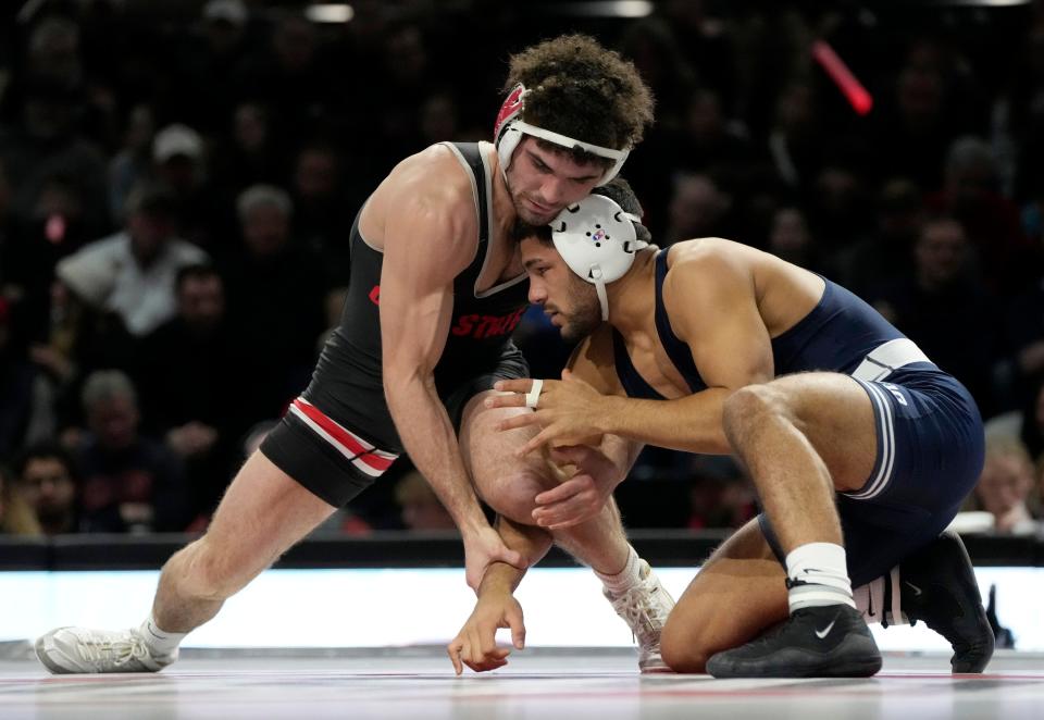 Before he was shot during a carjacking, Ohio State wrestler Sammy Sasso, left, was set to enter the 2023-24 season as a four-time All-American, a two-time Big Ten champion and a four-time NCAA tournament qualifier.