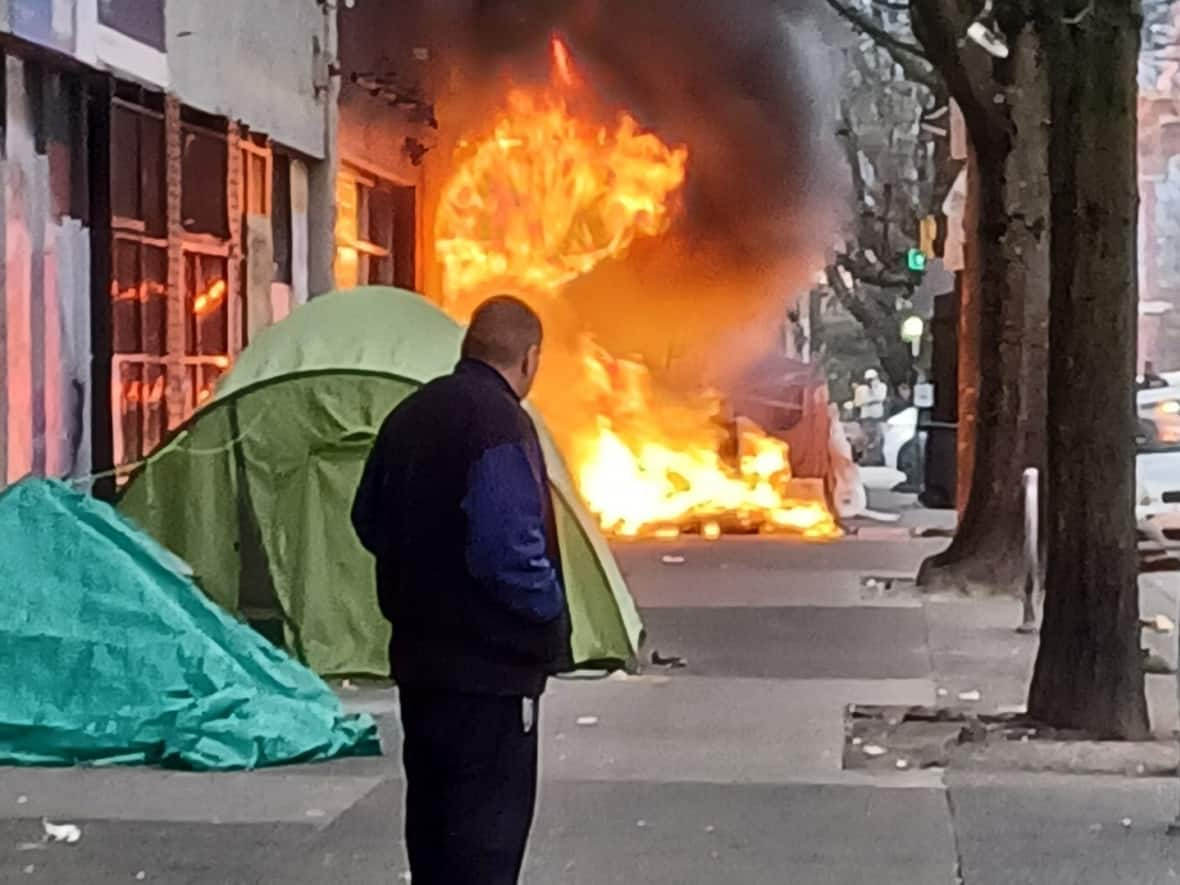 This blaze on Sunday on the Downtown Eastside appeared to have started after a propane tank exploded. The incident has renewed concerns from the Vancouver fire chief around fire safety and tents. (Karl Hartlen - image credit)