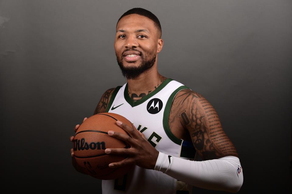 Damian Lillard poses for a photo on media day for the firs time in a Milwaukee Bucks uniform days after he was traded from the Portland Trail Blazers, where he had spent his entire NBA career.