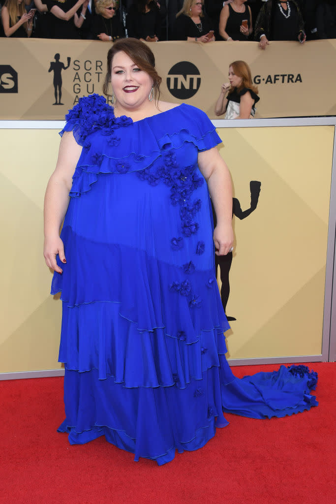 <p>Metz rocked a royal blue tiered dress with floral decor. (Photo: Getty Images) </p>