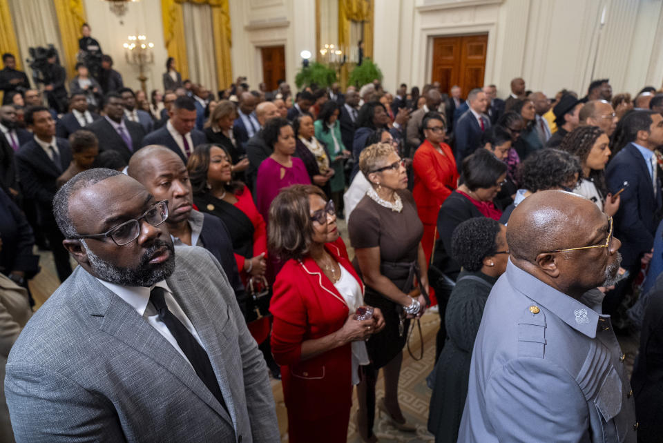 Members of the audience listen as President Joe Biden speaks at a reception in recognition of Black History Month in the East Room of the White House in Washington, Tuesday, Feb. 6, 2024. (AP Photo/Andrew Harnik)