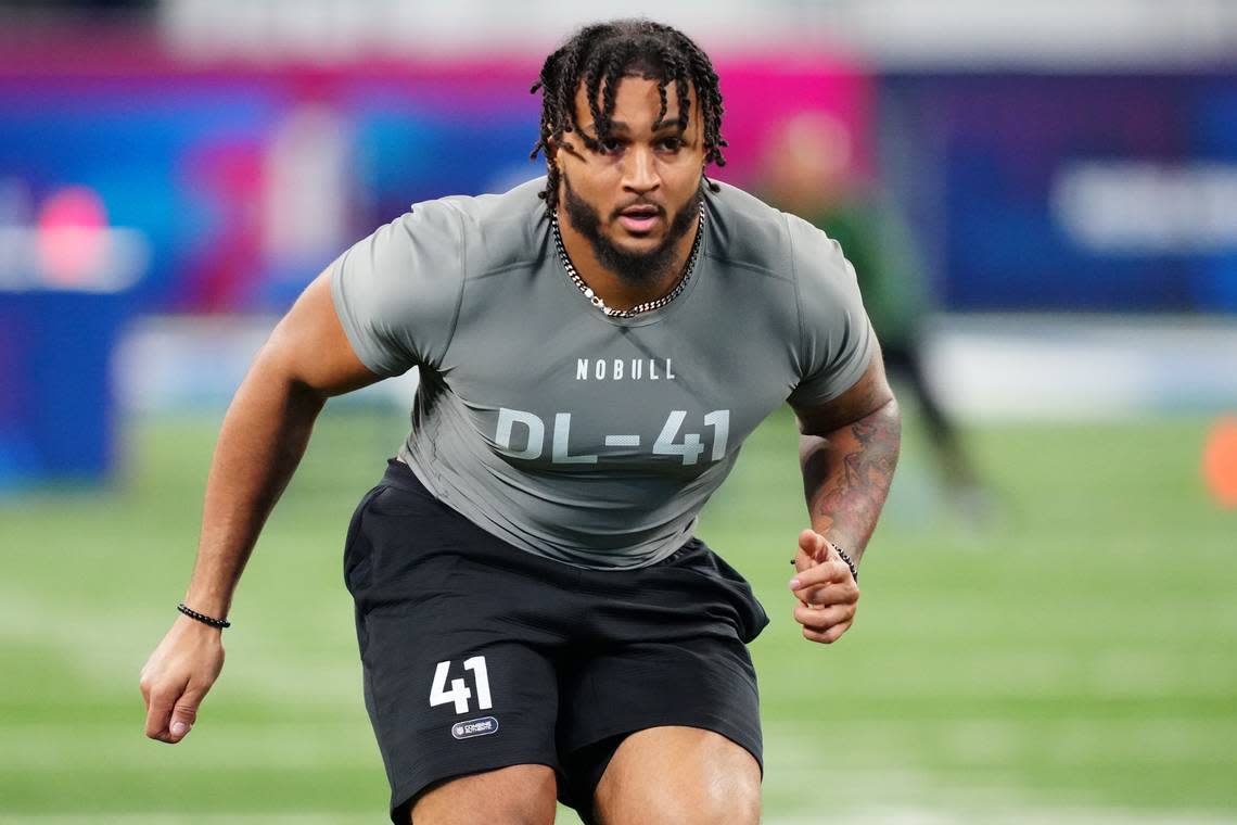 Feb 29, 2024; Indianapolis, IN, USA; Western Michigan defensive lineman Marshawn Kneeland (DL41) works out during the 2024 NFL Combine at Lucas Oil Stadium. Mandatory Credit: Kirby Lee-USA TODAY Sports