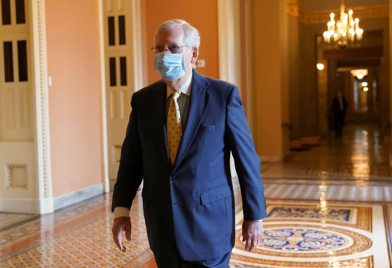 Mitch McConnell walks from his office at the U.S. Capitol in Washington