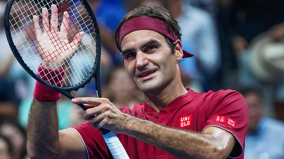 Roger Federer celebrates his win. (Photo by EDUARDO MUNOZ ALVAREZ / AFP)