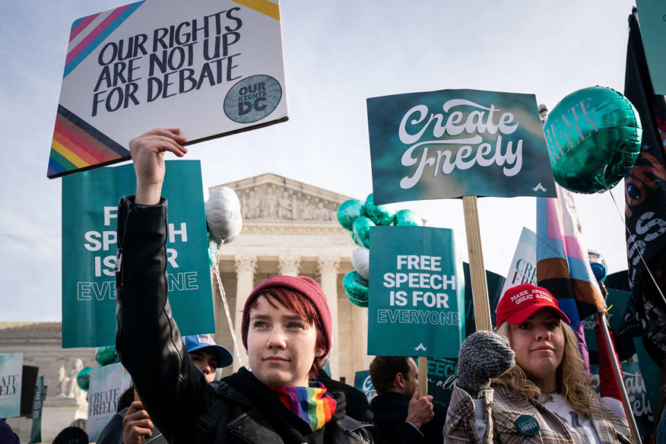 <div class="inline-image__caption"><p>Members of both sides of the debate stand in front of the Supreme Court of the United States on Dec. 5, 2022 in Washington, D.C. The High Court heard oral arguments in a case involving a suit filed by Lorie Smith, owner of 303 Creative, a website design company in Colorado who refused to create websites for same-sex weddings despite a state anti-discrimination law.</p></div> <div class="inline-image__credit">Kent Nishimura / Los Angeles Times via Getty Images</div>