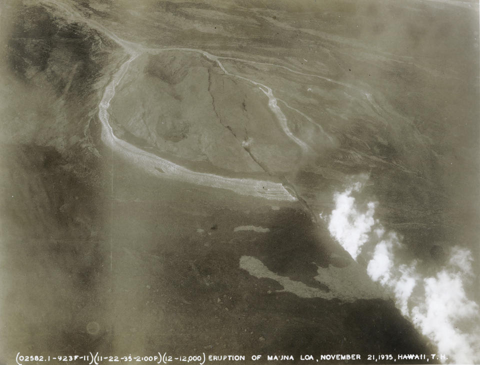 This photo provided by the United States Army Air Corps shows an aerial view of the Mauna Loa eruption on Nov. 21, 1935, captured by the US Army 11th Photo Section. Now Mauna Loa — the world's largest active volcano — is erupting again, and lava is slowly approaching a major thoroughfare connecting the Big Island's east and west sides. (United States Army Air Corps (USAAC), 11th Photo Section via AP)
