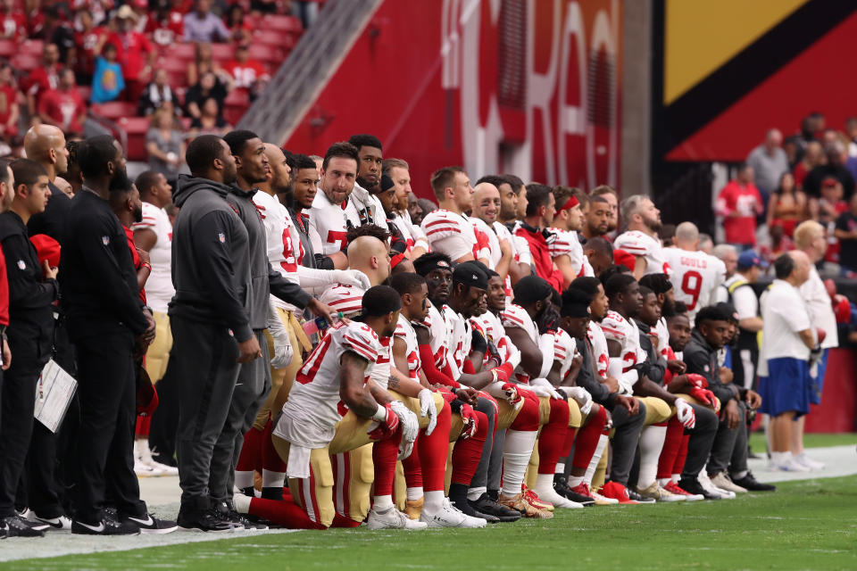 <p>Members of the San Francisco 49ers kneel for the National Anthem before the start of the NFL game against the Arizona Cardinals at the University of Phoenix Stadium on October 1, 2017 in Glendale, Arizona. (Photo by Christian Petersen/Getty Images) </p>