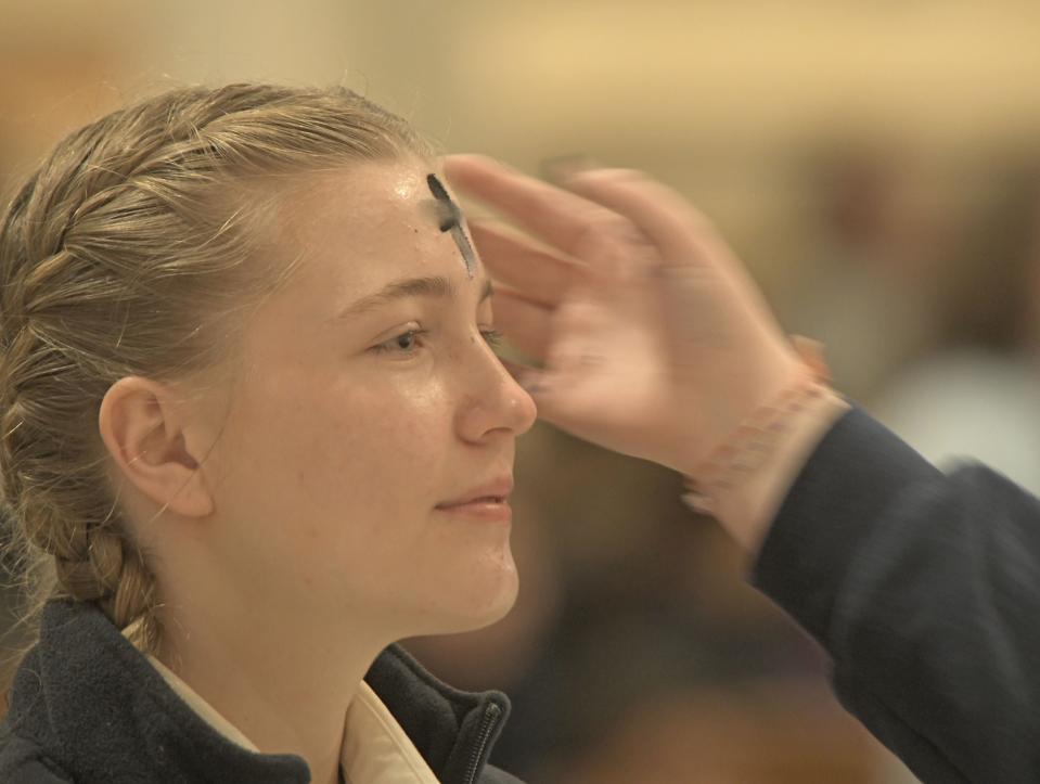 St. Peter's students parishioners celebrate Ash Wednesday.