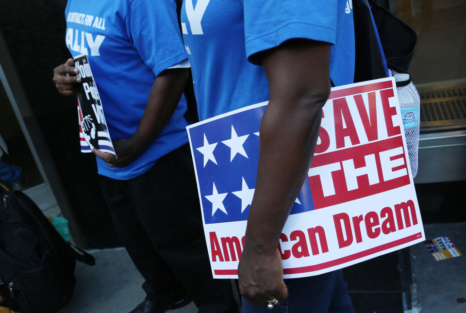 Union members from many different New York City unions attend a labor rally in front of City Hall to demand fair contract negotiations (Photo by Andrew Lichtenstein/Corbis via Getty Images)