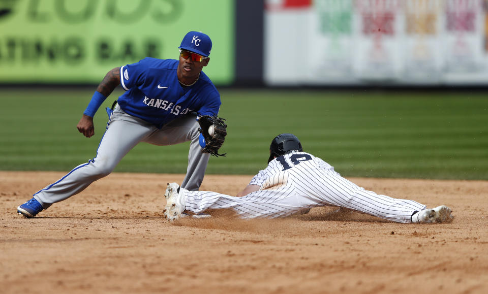 New York Yankees' Andrew Benintendi, right, steals second base against Kansas City Royals shortstop Maikel Garcia, left, during the sixth inning of a baseball game Sunday, July 31, 2022, in New York. (AP Photo/Noah K. Murray)