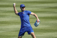 Chicago Cubs third baseman Kris Bryant throws the ball during baseball practice at Wrigley Field on Friday, July 3, 2020 in Chicago. (AP Photo/Kamil Krzaczynski)