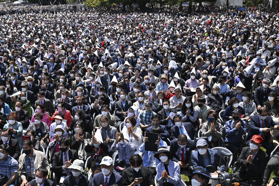 Crowds of people attend the inaugural ceremony for South Korea's new President Yoon Suk Yeol at the National Assembly in Seoul, South Korea, Tuesday, May 10, 2022. Yoon took office as South Korea’s new president Tuesday with a vow to pursue a negotiated settlement of North Korea's threatening nuclear program and an offer of “an audacious plan” to improve Pyongyang’s economy if it abandons its nuclear weapons. (Jung Yeon-je/Pool Photo via AP)