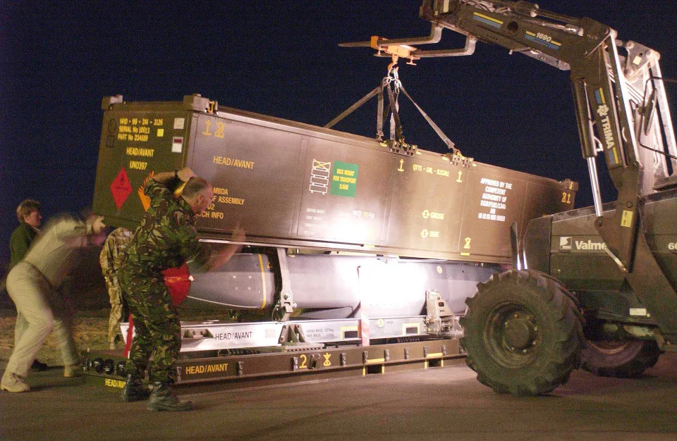 A Storm Shadow missile is prepared for loading to a Royal Air Force Tornado GR4 aircraft in the Gulf in support of Operation TELIC, March 21, 2003.