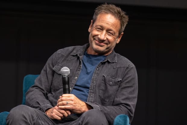 David Duchovny speaks onstage about his novel "The Reservoir" at Town Hall Seattle on June 09, 2022, in Seattle, Washington.<p><a href="https://www.gettyimages.com/detail/1402056005" rel="nofollow noopener" target="_blank" data-ylk="slk:Mat Hayward/Getty Images;elm:context_link;itc:0;sec:content-canvas" class="link ">Mat Hayward/Getty Images</a></p>