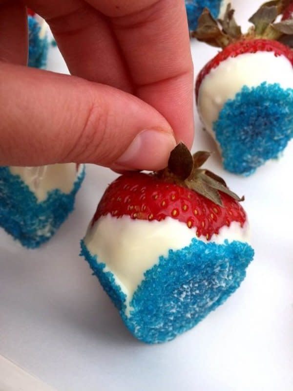 <p>Melanie Cooks</p><p>These beautiful red, white and blue chocolate-covered strawberries are extremely easy to make and will be the highlight of your Memorial Day party! </p><p><strong>Get the recipe: <a href="https://www.melaniecooks.com/red-white-blue-strawberries/9459/" rel="nofollow noopener" target="_blank" data-ylk="slk:Red, White & Blue Chocolate Covered Strawberries;elm:context_link;itc:0;sec:content-canvas" class="link ">Red, White & Blue Chocolate Covered Strawberries</a></strong></p>