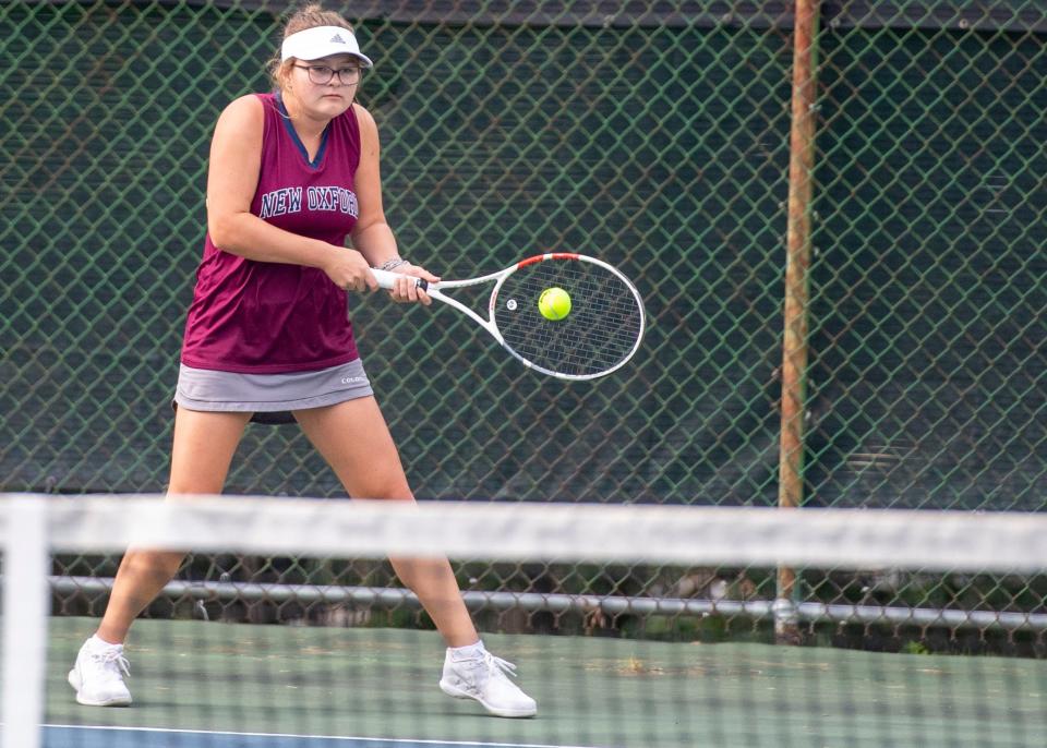 New Oxford's Allison Horick returns a shot to Dallastown's Elizabeth Tony in their No. 2 singles match on Friday, Sept. 22, 2023. Horick won 6-4, 6-1.