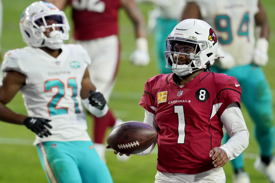 Arizona Cardinals quarterback Kyler Murray (1) runs for a touchdown as Miami Dolphins free safety Eric Rowe (21) defends during the second half of an NFL football game, Sunday, Nov. 8, 2020, in Glendale, Ariz. (AP Photo/Ross D. Franklin)