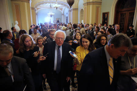 U.S. Senator Bernie Sanders leaves after attending the Senate Democrat party leadership elections at the U.S. Capitol in Washington, U.S. November 16, 2016. REUTERS/Carlos Barria