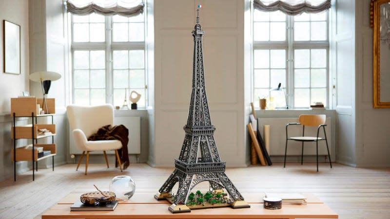 The Lego Eiffel Tower fully assembled sitting on a table.