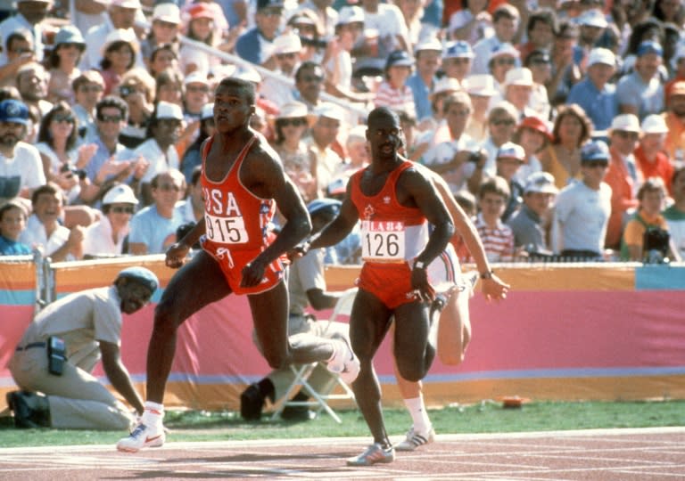 Carl Lewis (left) races Ben Johnson in the 100m final at the Los Angeles Olympics in August 1984