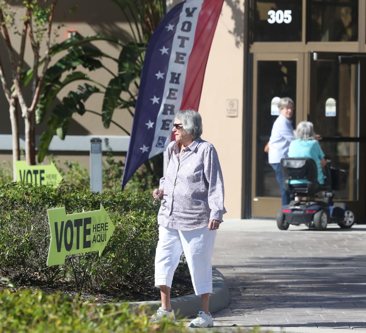 Early voting has commenced in Volusia and Flagler counties. Here voters in Palm Coast exit and enter the polling site in the Palm Coast Community Center on Tuesday.