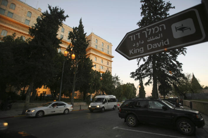 FILE - The exterior of the King David Hotel is seen from King David street in Jerusalem, Dec. 11, 2007. U.S. President Joe Biden's dash through the Israel and the occupied West Bank this week is expected to cut across some of the region's most iconic places. Both luxurious and grueling, Biden's visit starts with a VIP arrival at Israel's main commercial airport and pings through Jerusalem and the occupied West Bank. Most of his travels are focused on business, but in between his meetings with Israeli and Palestinian leaders, he will visit a host of well-known sites while staying at a historic Jerusalem hotel. (AP Photo/Dan Balilty, File)