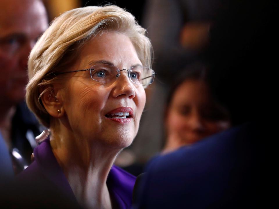 FILE PHOTO: Senator Elizabeth Warren does an interview in the Spin Room after the fourth Democratic U.S. 2020 presidential election debate at Otterbein University  in Westerville, Ohio October 15, 2019. REUTERS/Aaron Josefczyk/File Photo