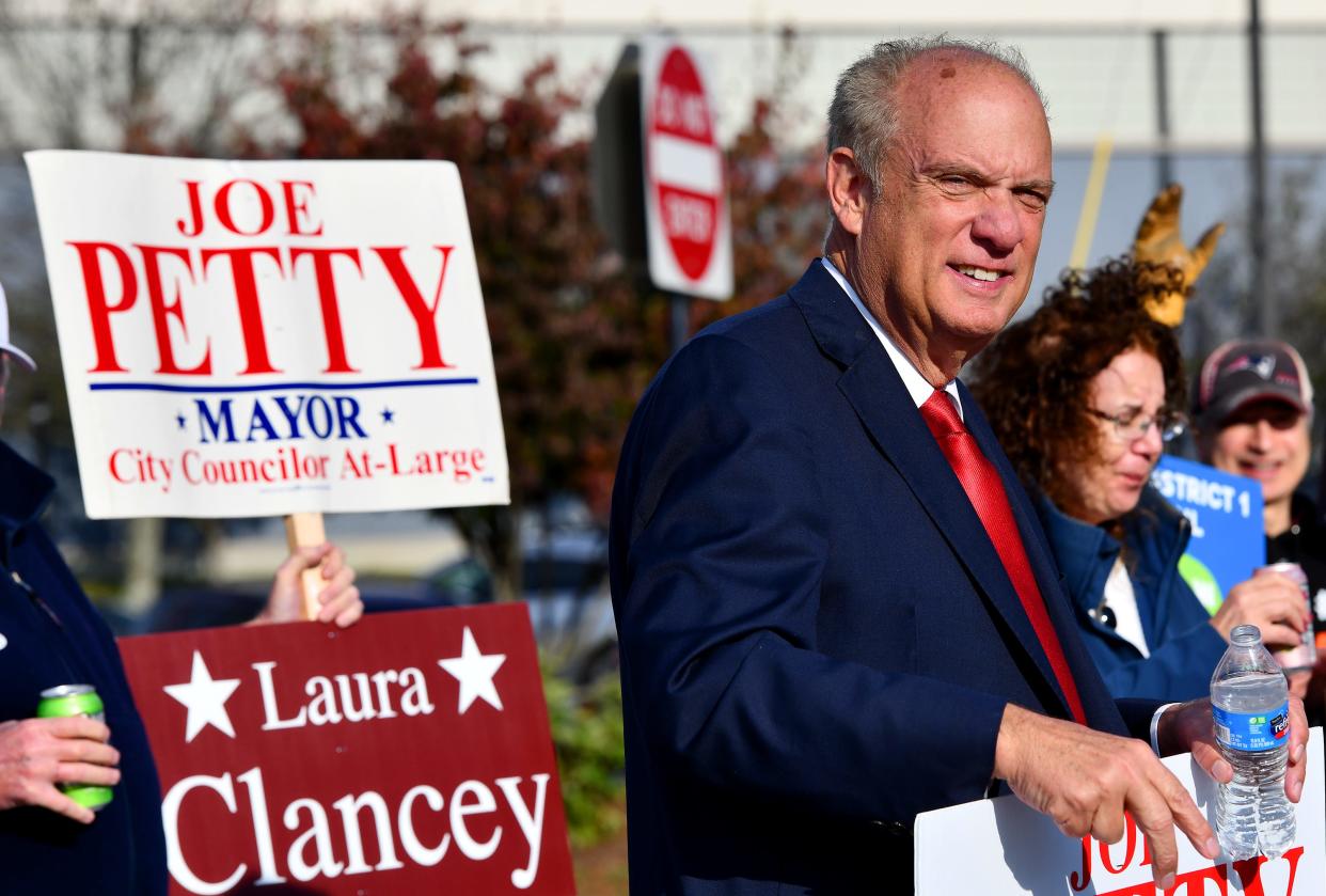 Incumbent Mayor Joe Petty stumps for votes in front of the Universalist Unitarian Church at Shore Drive and Holden Street on Tuesday afternoon. Petty coasted to a seventh term.