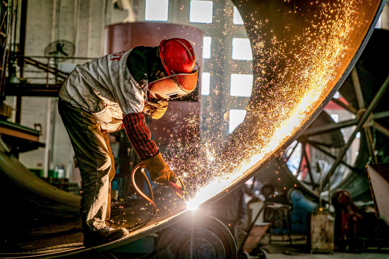 Image: Engineering equipment is prepared for export in March at a factory in China's eastern Jiangsu province (AFP via Getty Images)