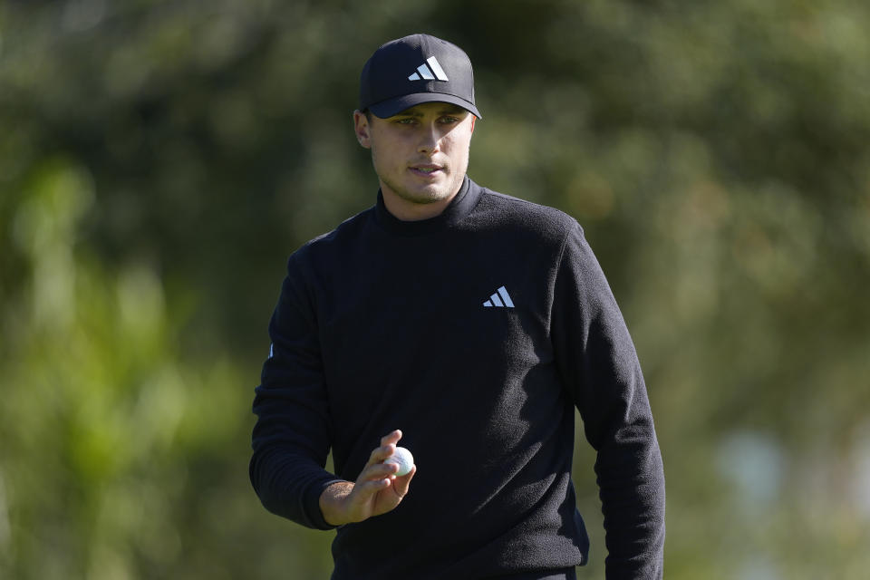 Ludvig Åberg gestures after making a birdie putt on the 14th hole at Pebble Beach Golf Links during the second round of the AT&T Pebble Beach National Pro-Am golf tournament in Pebble Beach, Calif., Friday, Feb. 2, 2024. (AP Photo/Ryan Sun)