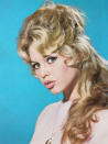 <div class="caption-credit"> Photo by: Getty Images</div><div class="caption-title">Brigitte Bardot</div>In the early 60s, the French siren piled half of her bodacious blonde curls on top of her head, letting bangs and face-framing tendrils escape…et voila! A star was born. <br> <b>Related: <a rel="nofollow noopener" href="http://www.cosmopolitan.com/hairstyles-beauty/hair-care/how-to-get-victorias-secret-model-hair?link=rel&dom=yah_life&src=syn&con=blog_cosmo&mag=cos" target="_blank" data-ylk="slk:How to Get Victoria's Secret Hair;elm:context_link;itc:0;sec:content-canvas" class="link ">How to Get Victoria's Secret Hair</a> <br> Related: <a rel="nofollow noopener" href="http://www.cosmopolitan.com/hairstyles-beauty/celebrity-hair/top-hair-trends-2012?link=rel&dom=yah_life&src=syn&con=blog_cosmo&mag=cos" target="_blank" data-ylk="slk:Top Hair Trends of 2012;elm:context_link;itc:0;sec:content-canvas" class="link ">Top Hair Trends of 2012</a> <br> <br></b>