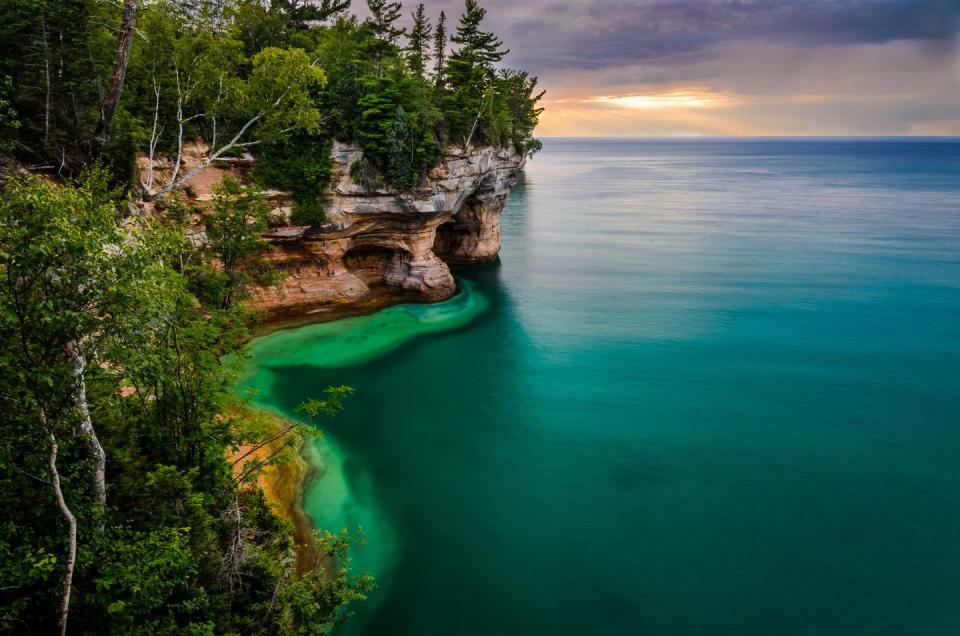 <p><strong>Pictured Rocks National Lakeshore</strong></p><p>Along the south shore of Lake Superior in Michigan’s Upper Peninsula, <a href="https://www.nps.gov/piro/index.htm" rel="nofollow noopener" target="_blank" data-ylk="slk:Pictured Rocks National Lakeshore;elm:context_link;itc:0;sec:content-canvas" class="link ">Pictured Rocks National Lakeshore</a> is known for picturesque, multicolored rock cliffs. Unusual sandstone formations define this lakeshore. Visitors can also walk through a white birch forest in Twelvemile Beach.</p>