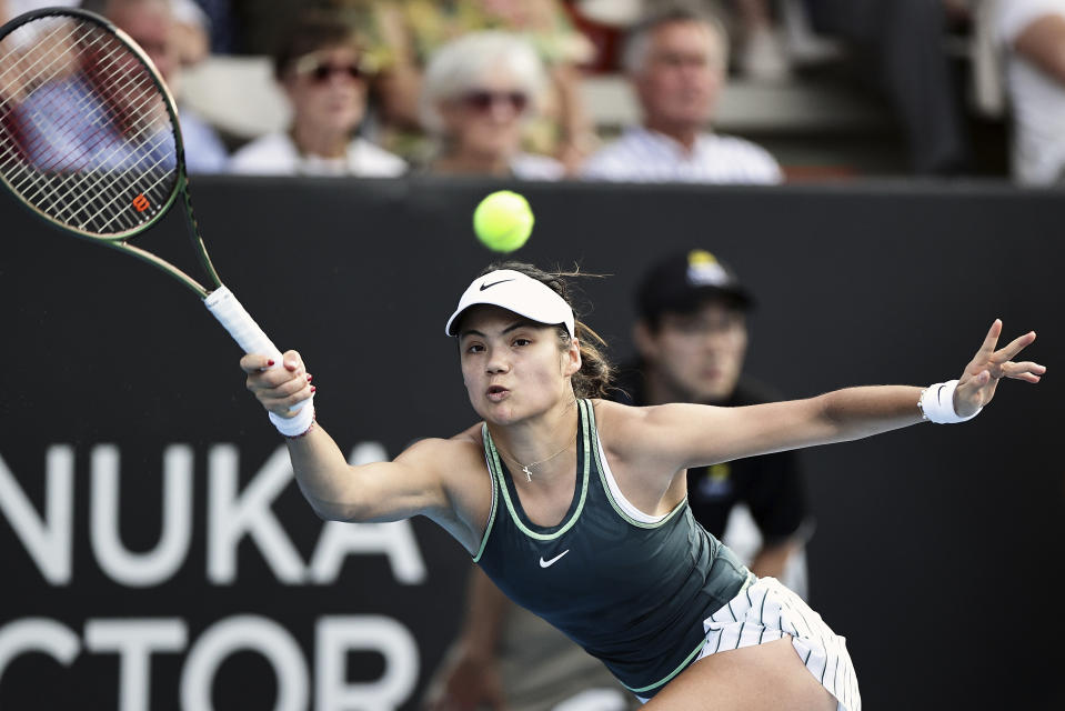 Emma Raducanu of Great Britain plays a forehand return to Elina Svitolina of Ukraine at the ASB Tennis Classic in Auckland, New Zealand, Thursday, Jan. 4, 2024. (David Rowland/Photosport via AP)